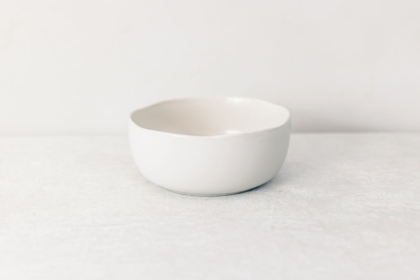 White ceramic bowl on a white background