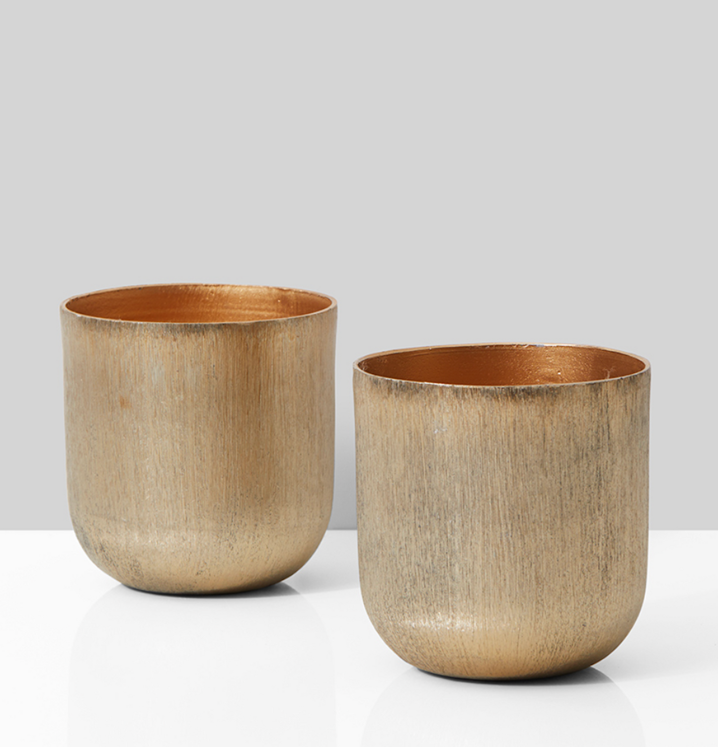Two matte gold textured vases