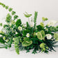 All greenery floral meadow featuring funky, tropical flowers