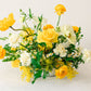 Yellow floral arrangement on a white background