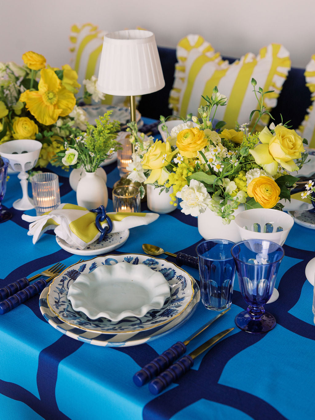 Decorative table setting with blue and yellow theme