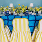 Blue white and yellow decorative table with yellow flowers and white lamps