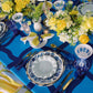 Decorative table setting with blue and yellow theme