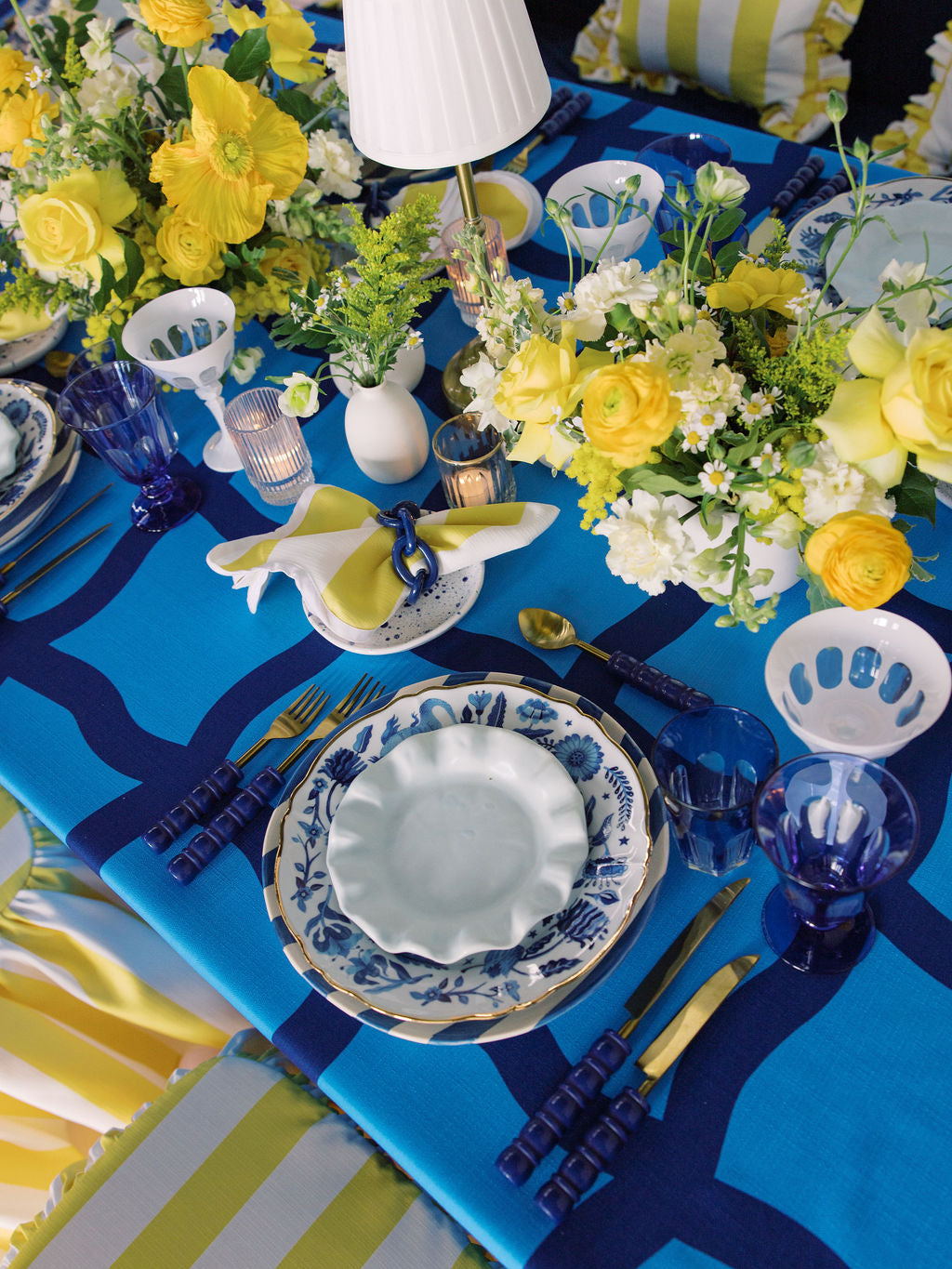 Decorative table setting with blue and yellow theme